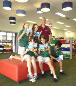 Nightcliff Community Bank manager with students