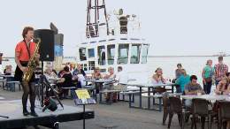 Anne Bavin entertains with her sax