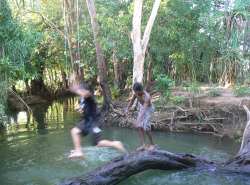 Local boys enjoying a freshwater creek.