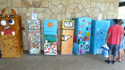 Viewing some of the many fridges on display.