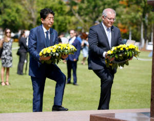Abe and Morrison laying wreaths Abe and Morrison laying wreaths