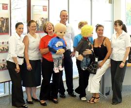 Camp Quality staff and their puppets.