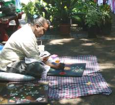 Traditional dot paintings are part of a culture thousands of years old.