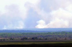 Fires are a natural part of the seasonal pattern. Dry season smoke rising.