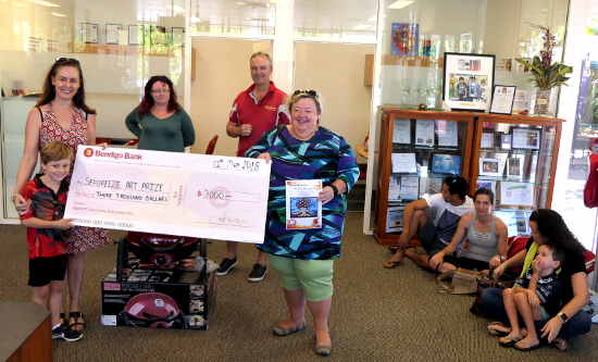 Alawa School accepting cheque